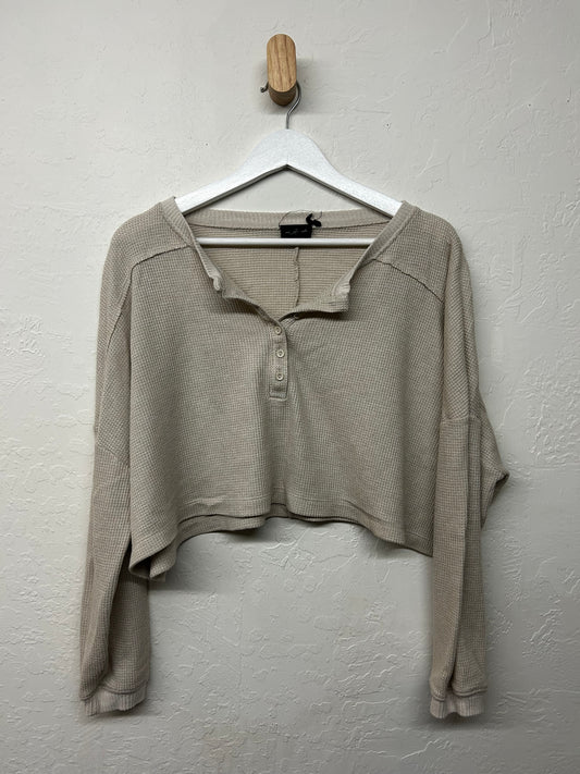 Cropped light beige sweater