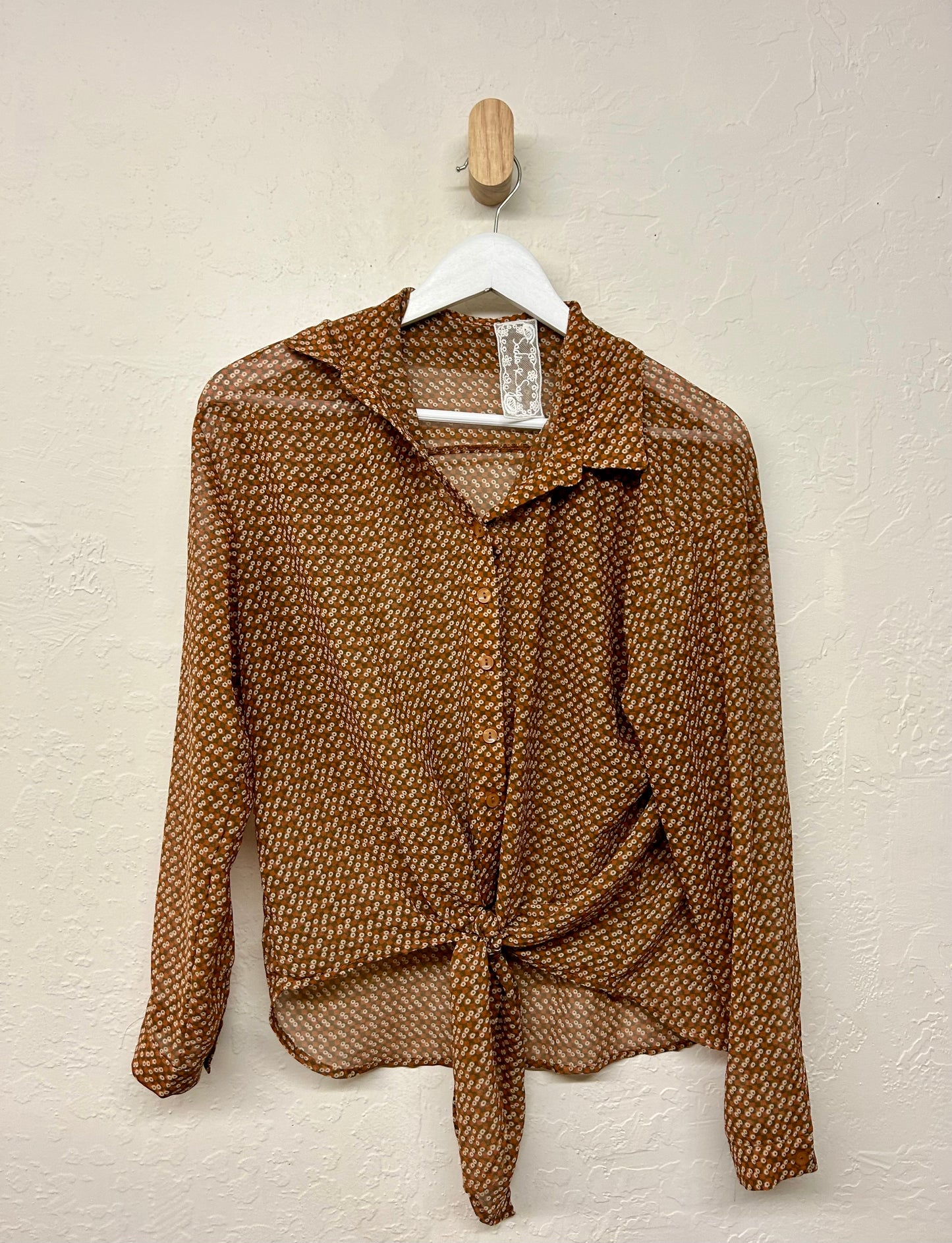 Patterned brown long sleeve blouse